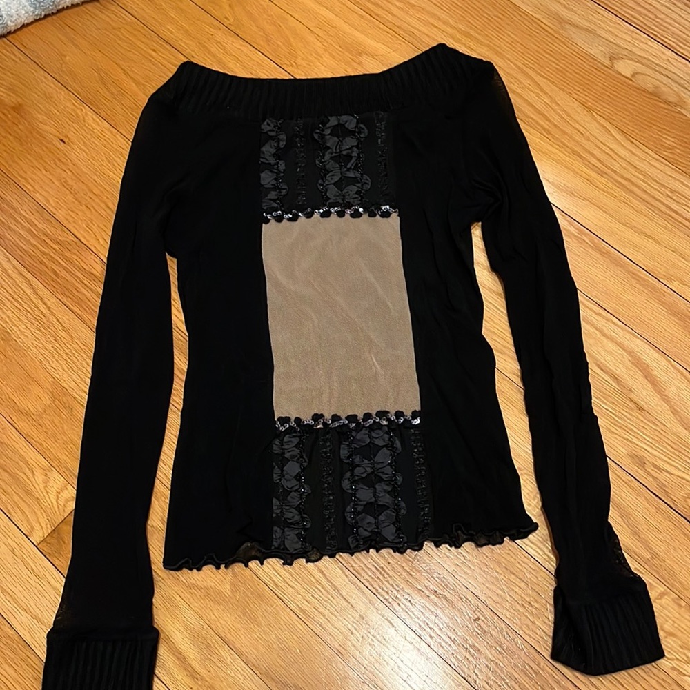 Great night out shirt with friends! Lightly see through shirt. Lightly used!